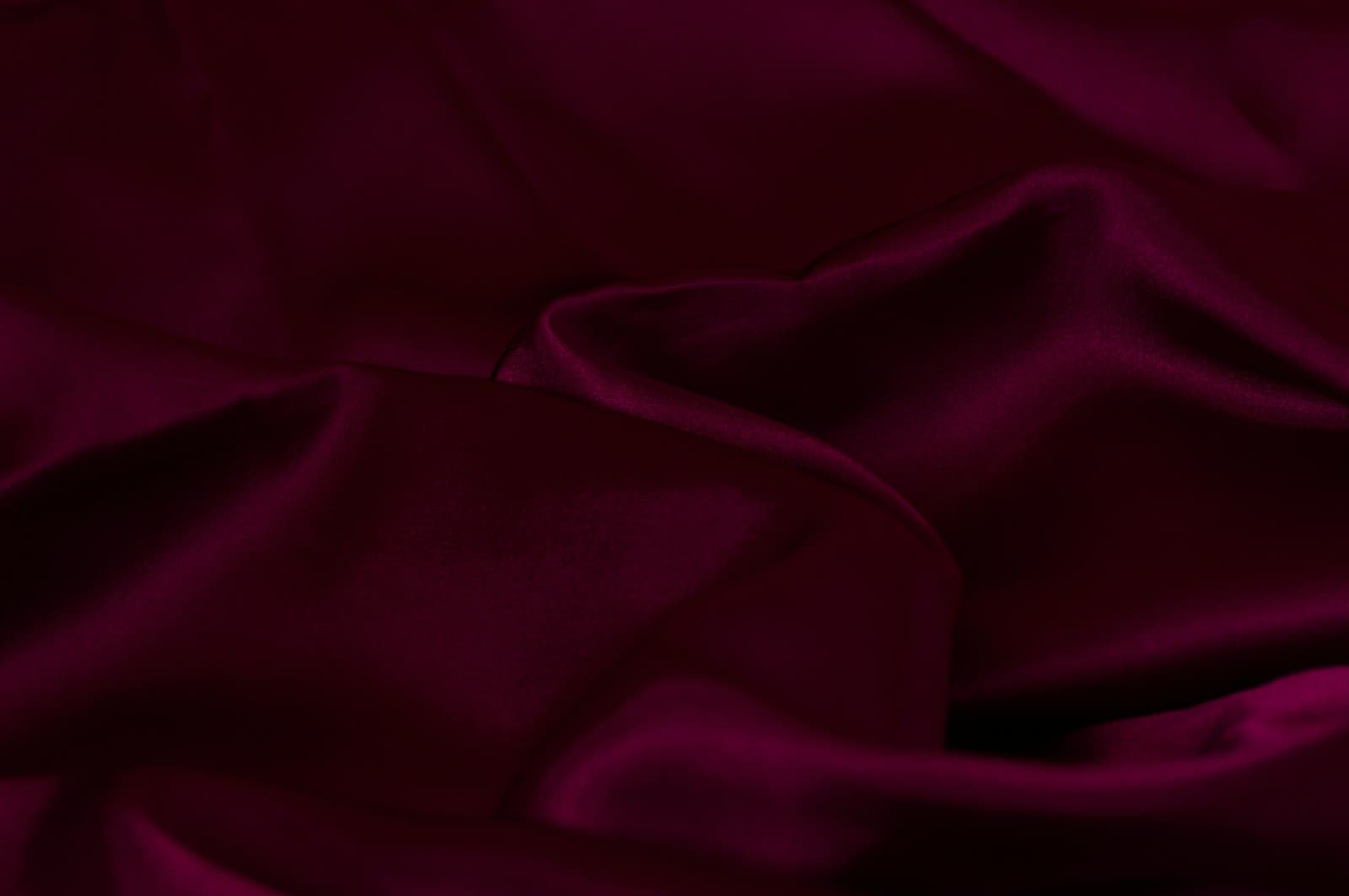 Draped silk in rose and gold — a queen's courage in the palace