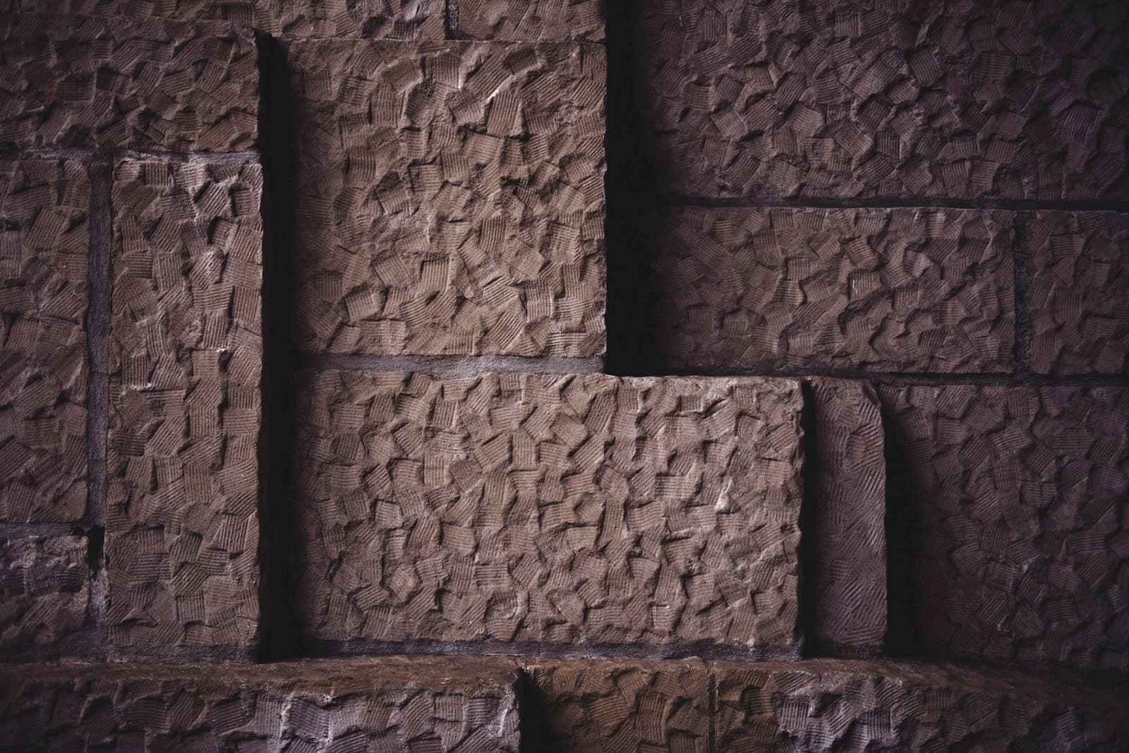 Hewn stone blocks ready to be laid — rebuilding the temple