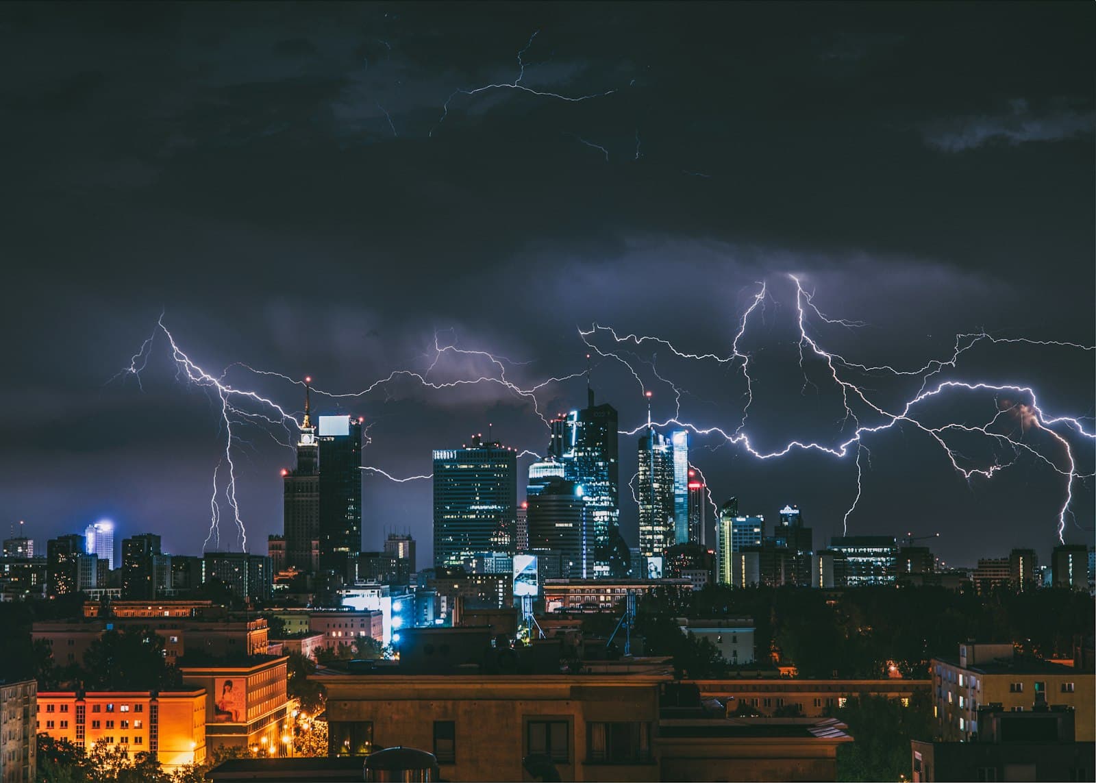 Lightning striking across a night skyline — the fall of Nineveh